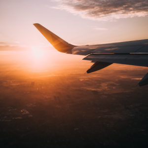 A horizontal image captured from air plane window for a magical sunset