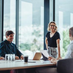 Business people having casual discussion during meeting