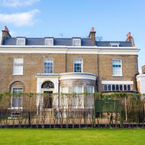 Facade of an opulent restored Victorian mansion in London