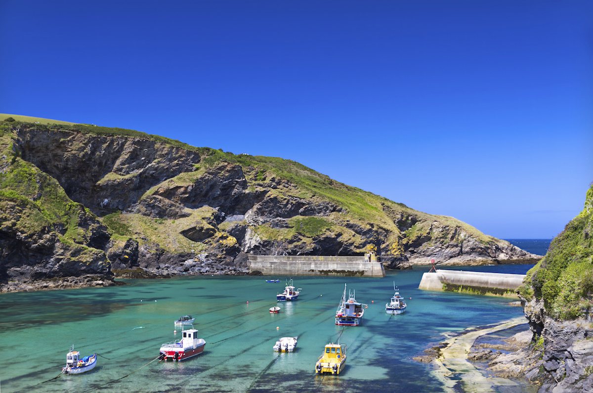 Harbour in fishing village Port Isaac, Cornwall, England - Stephens Scown